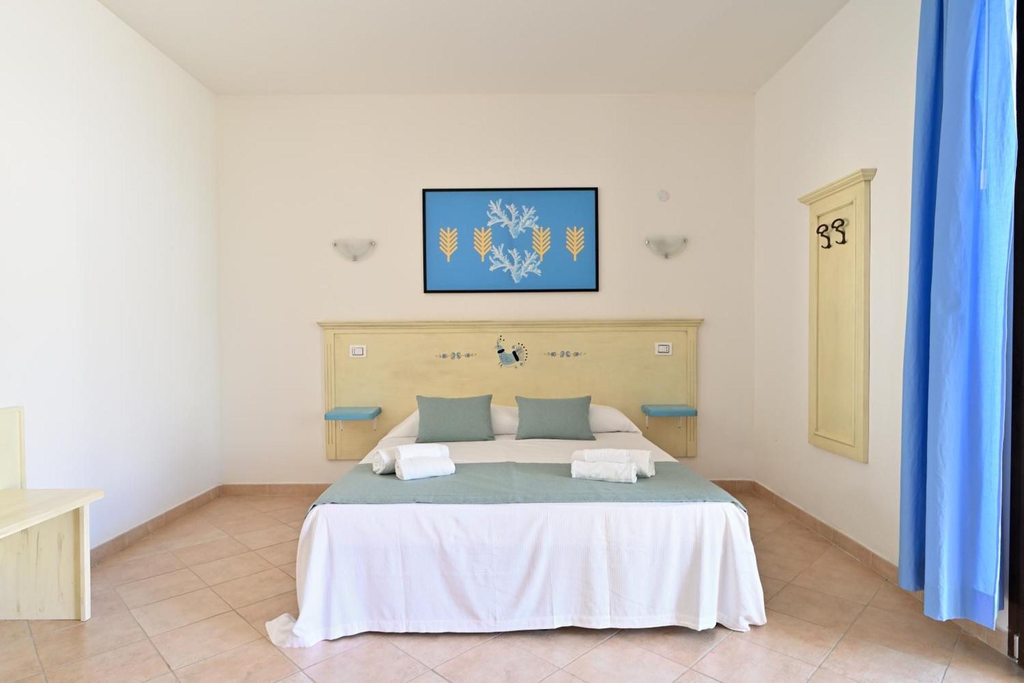 Mimose Beach Village Badesi Bagian luar foto